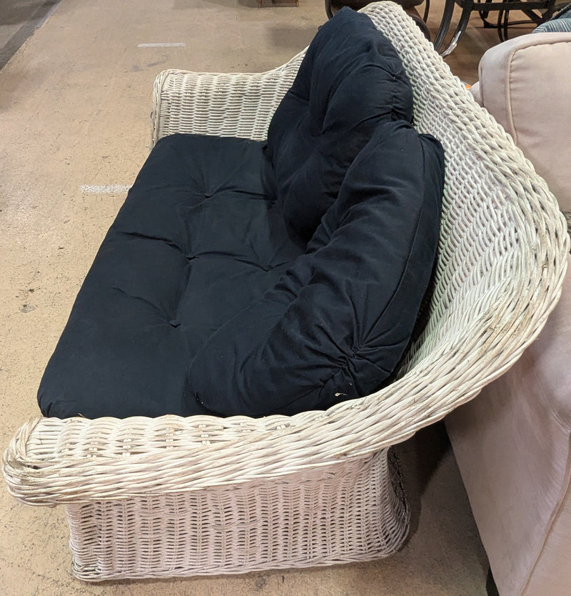 Wicker Loveseat with Black Cushions