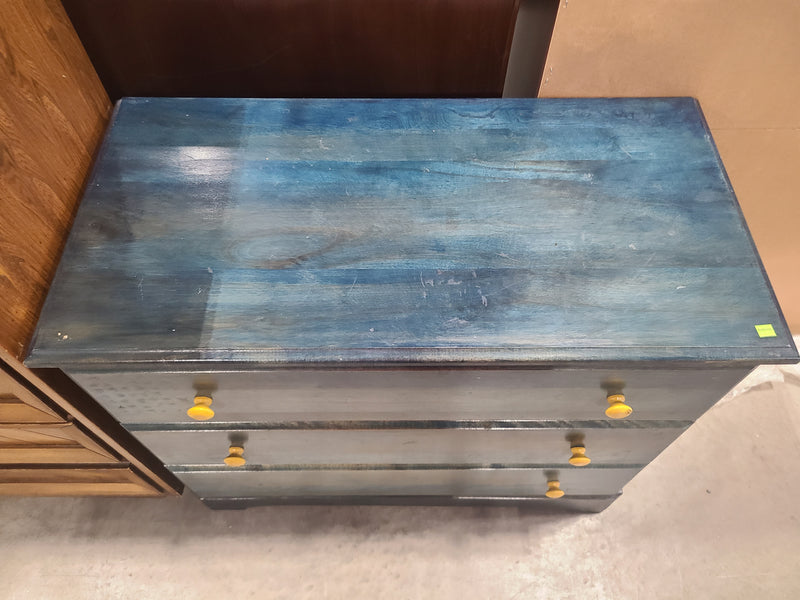 Blue Stained Wooden 3-Drawer Dresser with Yellow Knobs