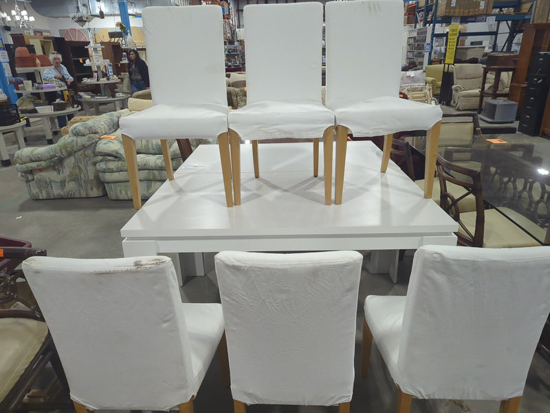 White Rectangular Dining Table with 6 White Chairs