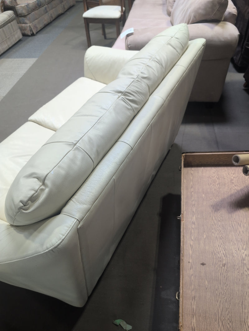 Cream Colored Leather Loveseat