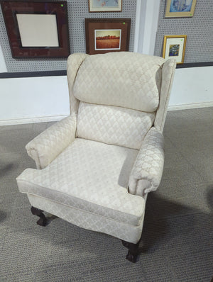 Cream wingback chair