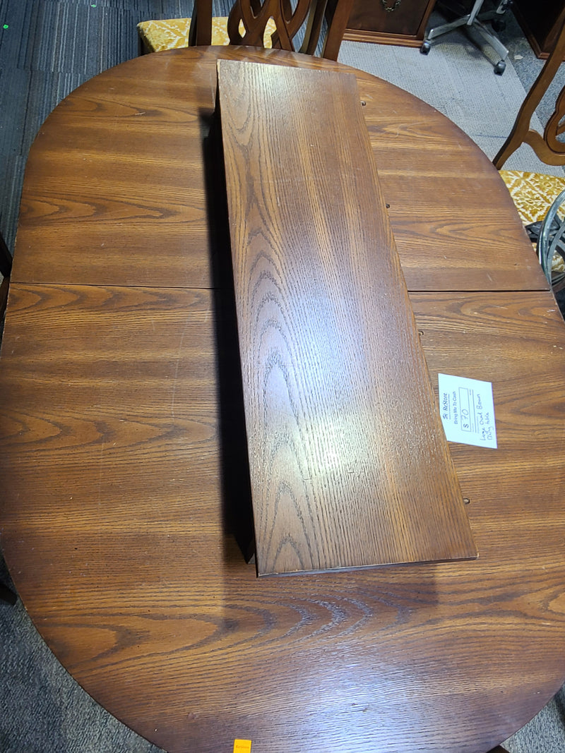 Large Oval Brown Wooden Dining Table with Extension Leaf