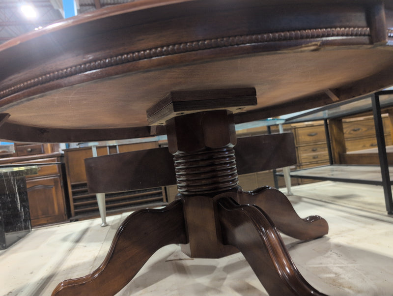 Round Reddish-Brown Coffee Table