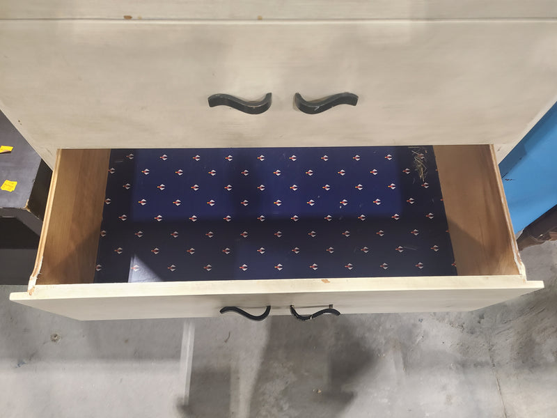 White 4-Drawer Dresser with Black Handles