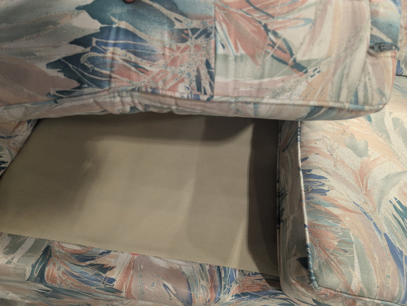 Pink, Blue, Teal, and White Loveseat