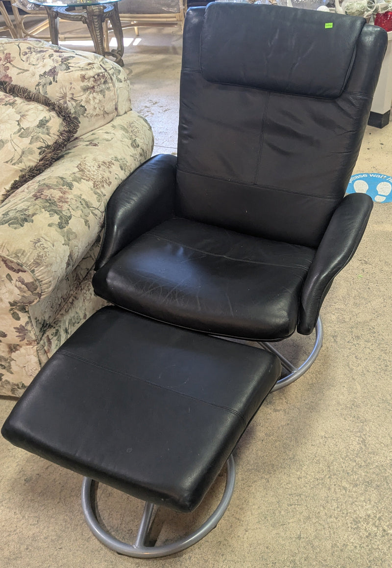 Black Swivel Armchair and Footstool