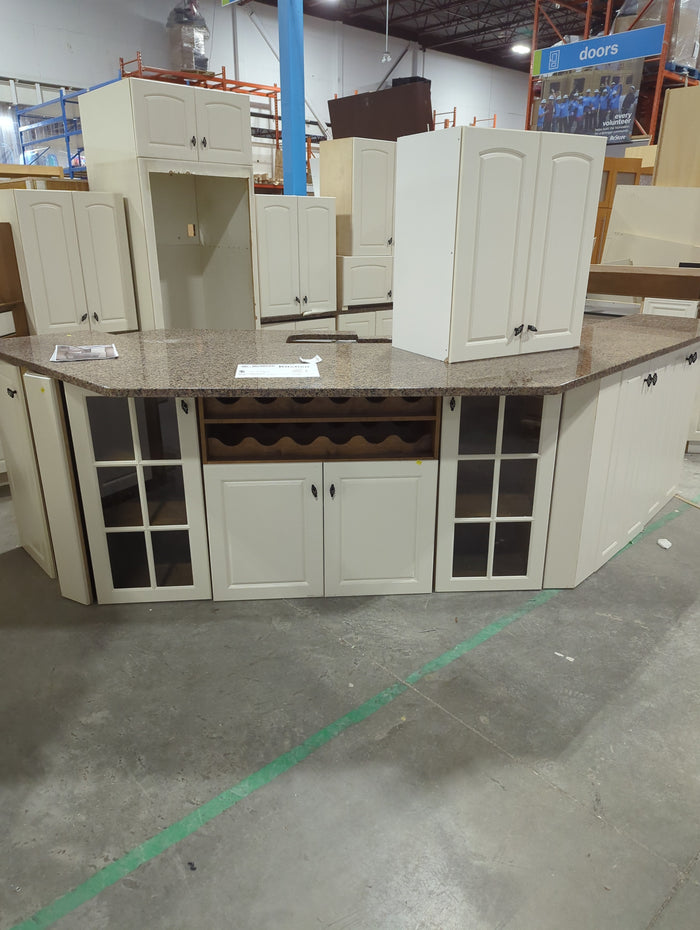 White kitchen with large island