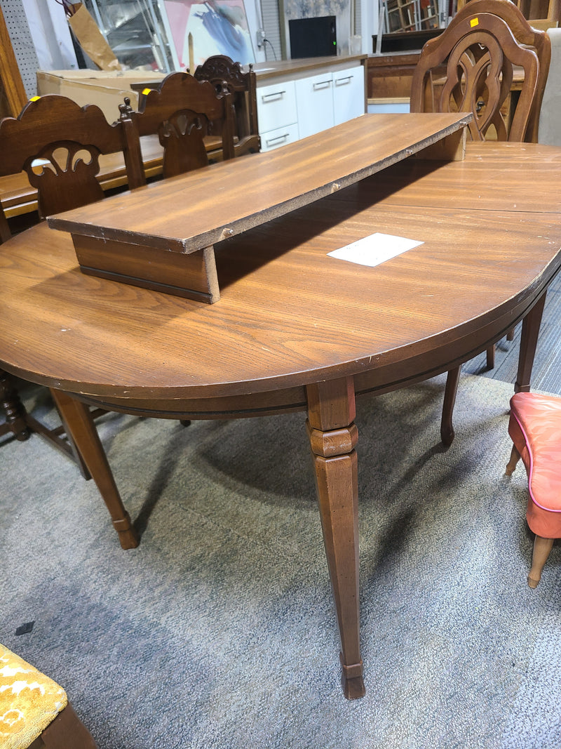 Large Oval Brown Wooden Dining Table with Extension Leaf