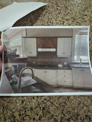 White kitchen with large island