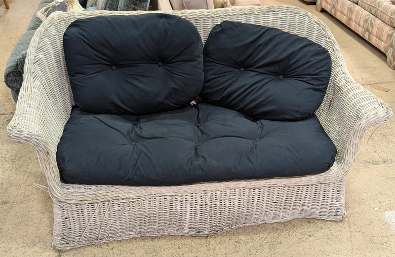 Wicker Loveseat with Black Cushions