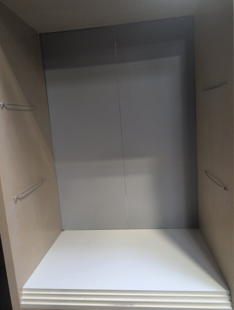 Tall White and Tan Shelving Unit