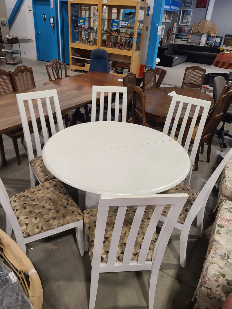 White Extension Pedestal Dining Table with 6 Upholstered Chairs