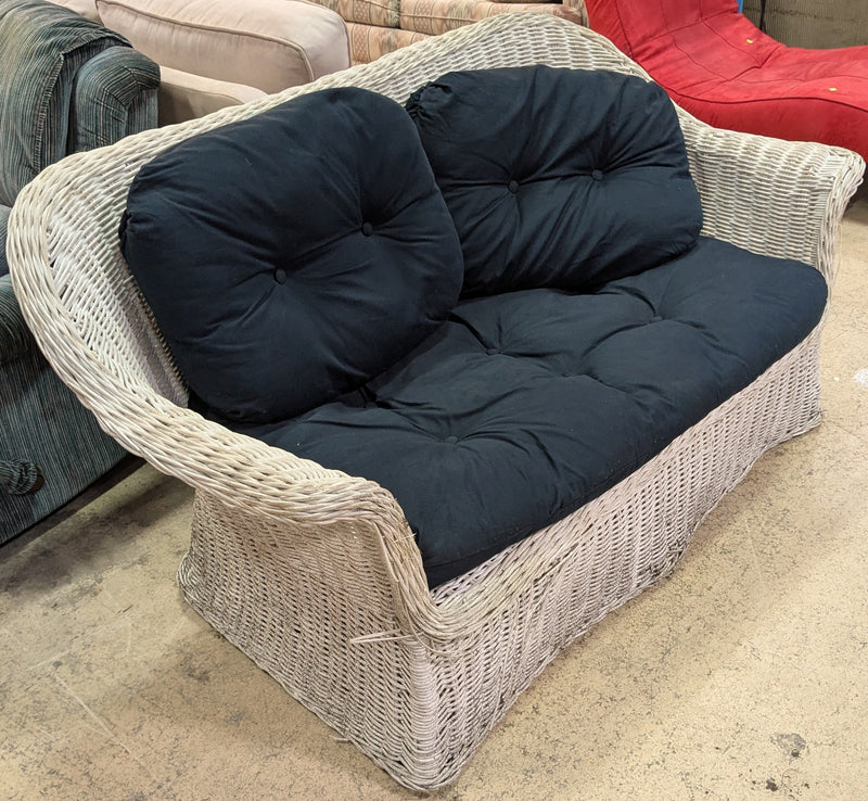 Wicker Loveseat with Black Cushions