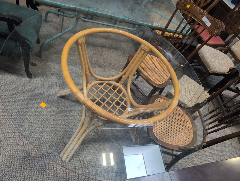 Round Glass Dining Table with a Rattan Body