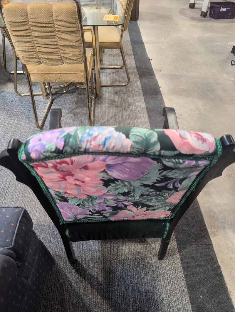 Black Armchair with Green Fabric and Floral Designs