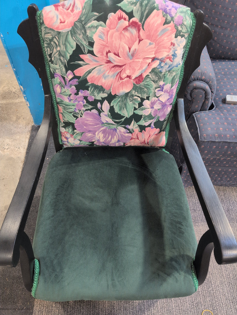Black Armchair with Green Fabric and Floral Designs