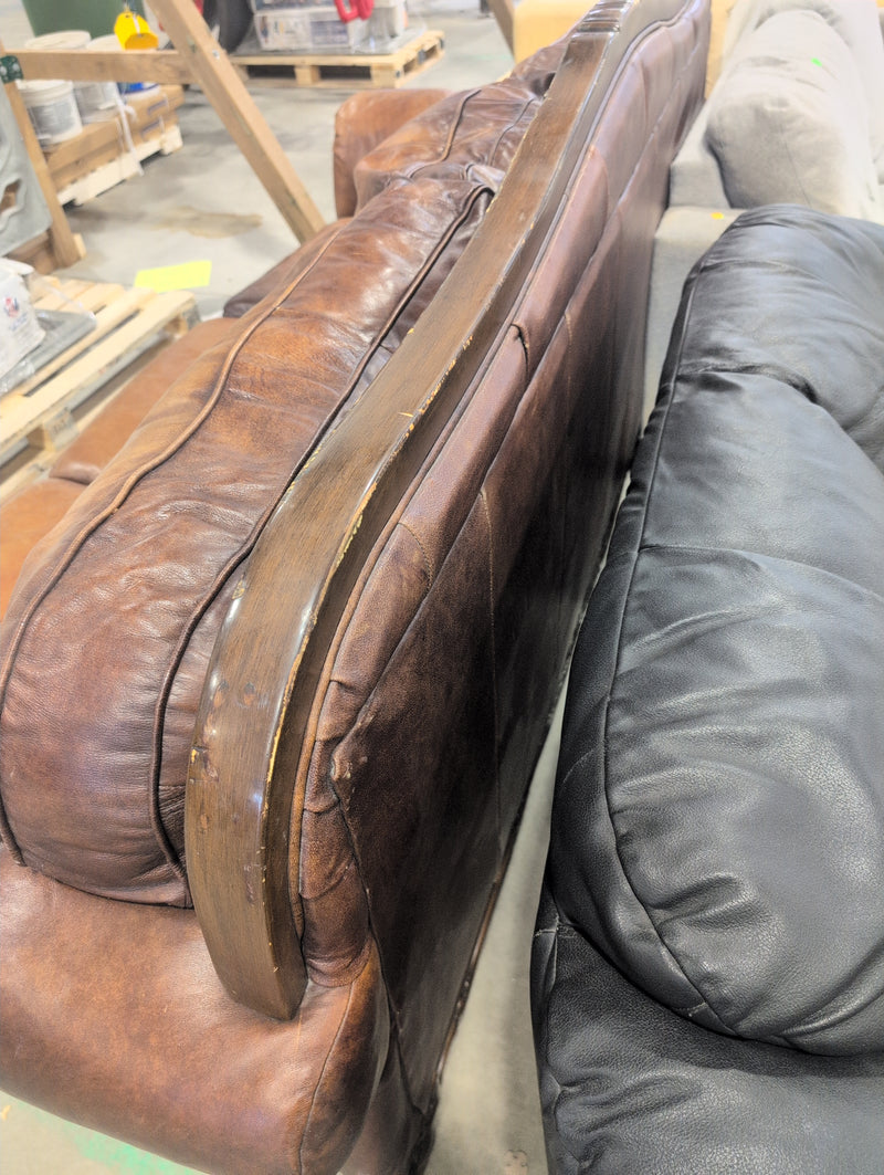 Leather Sofa with Ornate Wooden Framing