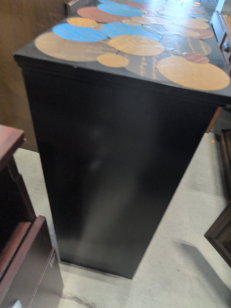 Black Accent Cabinet with Transparent Doors and Colorful Tabletop