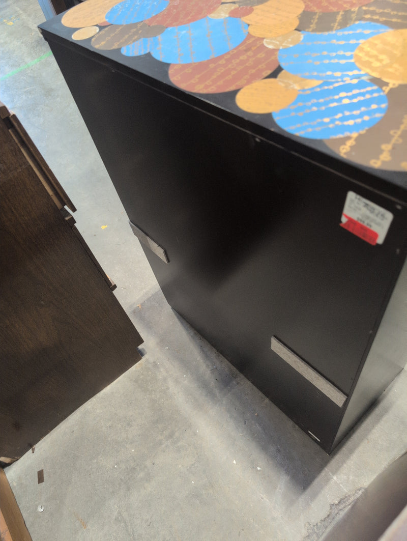 Black Accent Cabinet with Transparent Doors and Colorful Tabletop