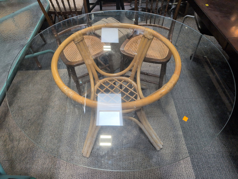 Round Glass Dining Table with a Rattan Body