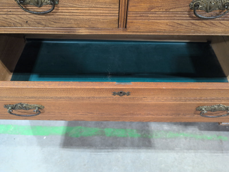 Brown Wooden Dresser with 4 Green Drawers