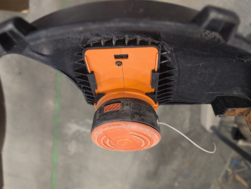 Orange and Black Battery Powered Stringtrimmer