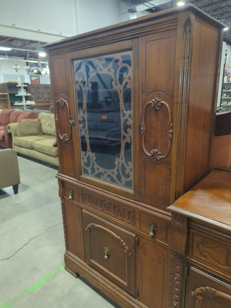 Antique Wooden Cabinet with Ornate Carved Details