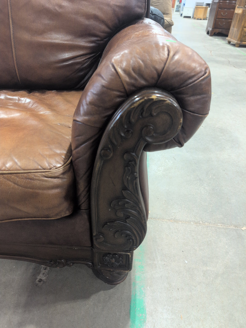 Leather Sofa with Ornate Wooden Framing