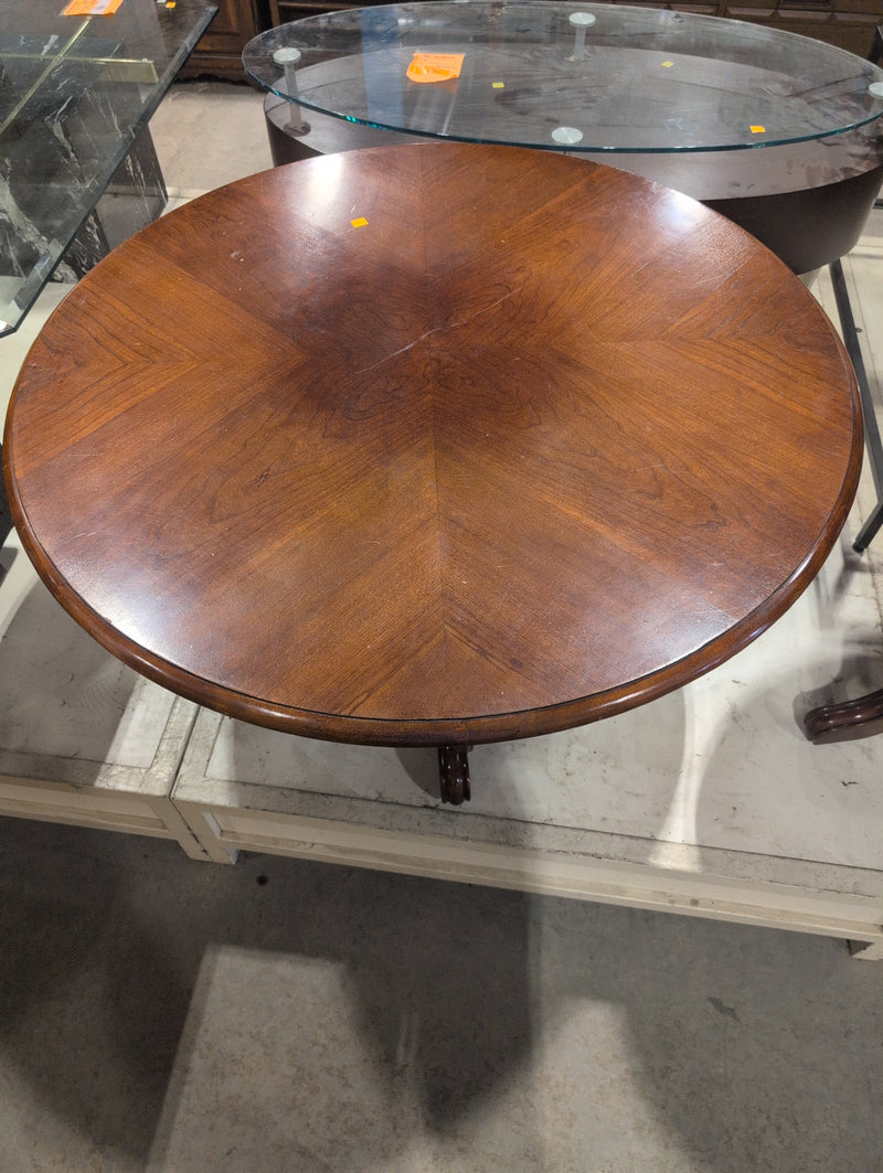 Round Reddish-Brown Coffee Table