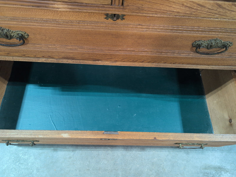 Brown Wooden Dresser with 4 Green Drawers