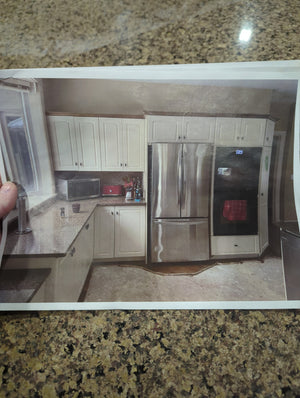 White kitchen with large island