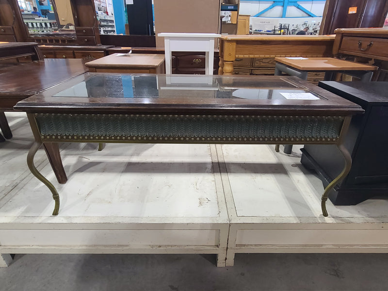 Elegant Coffee Table with Glass Top and Metal Details
