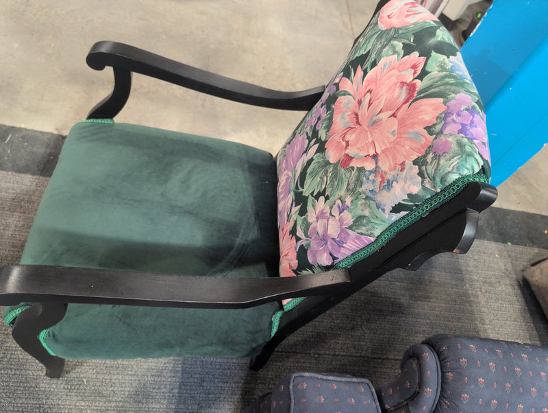Black Armchair with Green Fabric and Floral Designs