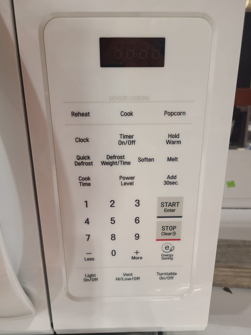 Sleek & Spacious LG Over-the-Range Microwave – Crisp White