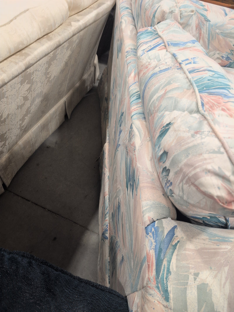 Pink, Blue, Teal, and White Loveseat