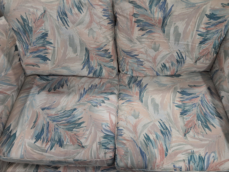 Pink, Blue, Teal, and White Loveseat