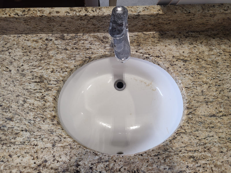 Granite Vanity Top with Sink, Faucet, and Espresso Cabinet Base