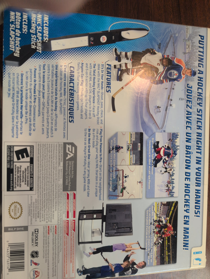 NHL Slapshot Wii Game and Hockey Stick Wii Remote and Nunchuk Holder