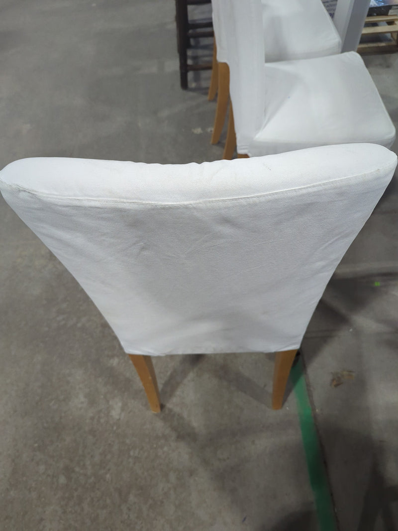 White Rectangular Dining Table with 6 White Chairs