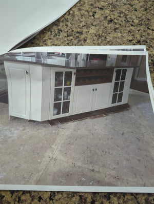 White kitchen with large island