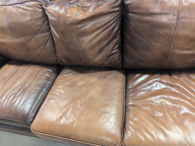 Leather Sofa with Ornate Wooden Framing