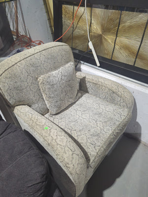 Beige Armchair with Snake-skin Pattern and Matching Throw Pillow.