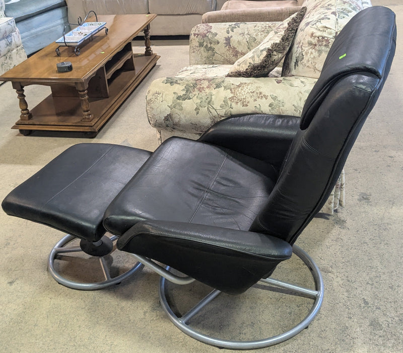 Black Swivel Armchair and Footstool