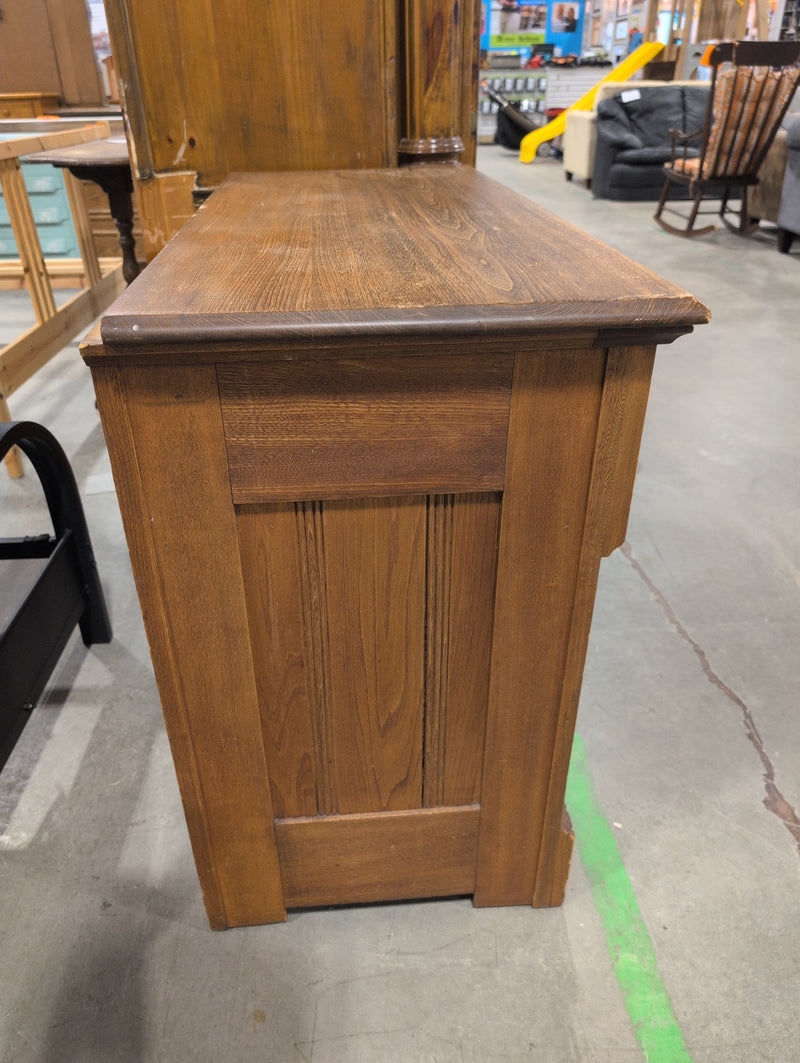 Brown Wooden Dresser with 4 Green Drawers