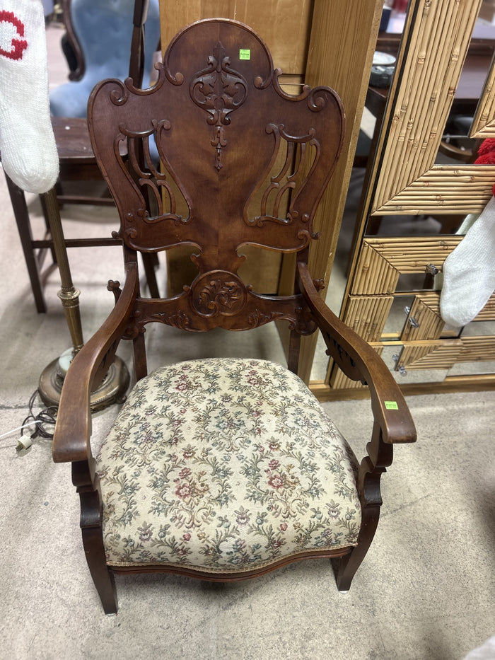 Ornate Antique Wooden Armchair with Floral Upholstery