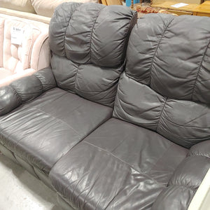 Faux leather reclining loveseat