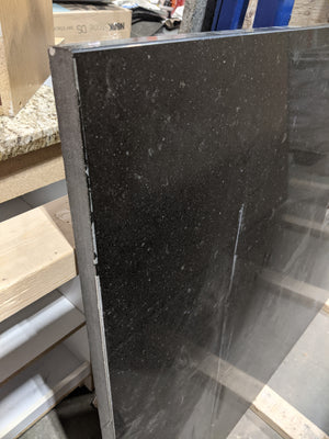 Speckled Black Caesarstone Countertop with Sink Cut-Outs