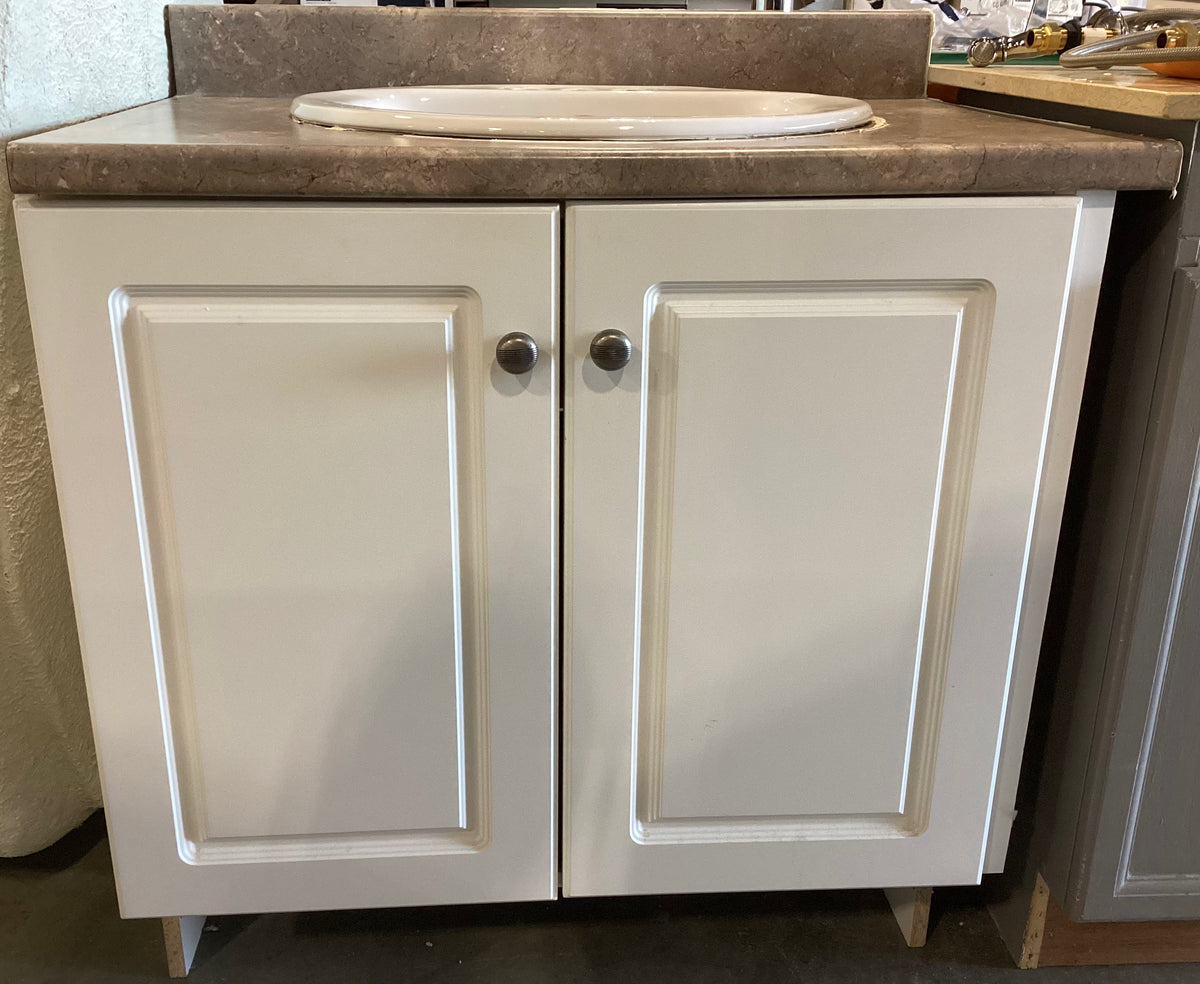 White Vanity with Multicoloured Countertop and Sink Habitat for Humanity Greater Ottawa ReStore
