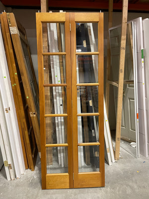 Wood Panel Bi-Fold Door