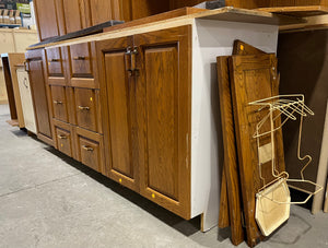 Oak Kitchenette with Vintage Hardware, Corner Shelf Unit, and Microwave Cabinet